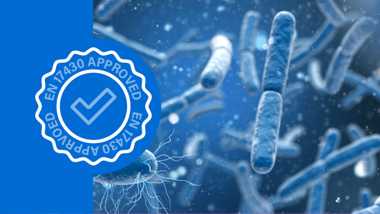 Close-up of blue microorganisms with a 'EN 1430 APPROVED' seal on the left side.