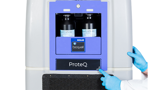Bioquell's ProteQ solution box detail with hand pointing at closed glove box component.